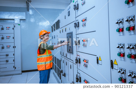 Engineer checking and inspecting at MDB panel .they working with electric switchboard to check range of voltage working in Main Distribution Boards factory. Engineer checking and inspecting at MDB panel .they working with electric switchboard to check range of voltage working in Main Distribution Boards factory. 90121337