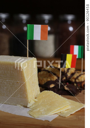 Irish Cheese With Belgian Chocolate and Coconut Macaroons in Rustic Kitchen 90126458