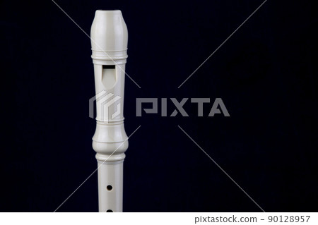 Recorder Wind Instrument Isolated on a Blue Background Recorder Wind Instrument Isolated on a Blue Background 90128957