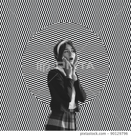 Young surprised woman over black and white optical illusion design background. Optical illusion, contemporary art, surrealism, creativity concept Young surprised woman over black and white optical illusion design background. Optical illusion, contemporary art, surrealism, creativity concept 90129796