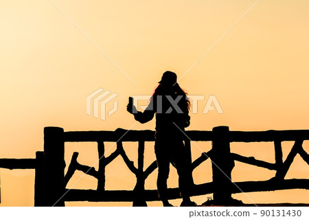 Silhouette of people having fun 90131430
