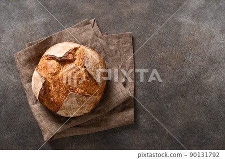 Loaf of freshly baked whole grain bread. Loaf of freshly baked whole grain bread. 90131792