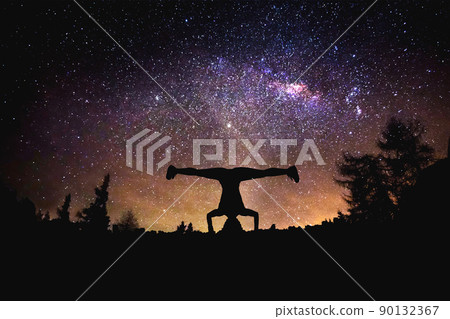 yoga at the night starry sky background. Mixed media yoga at the night starry sky background. Mixed media 90132367