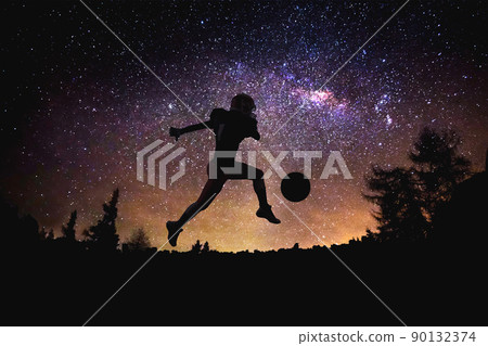 player american football man jumping silhouette at the night starry sky and moon background. player american football man jumping silhouette at the night starry sky and moon background. 90132374