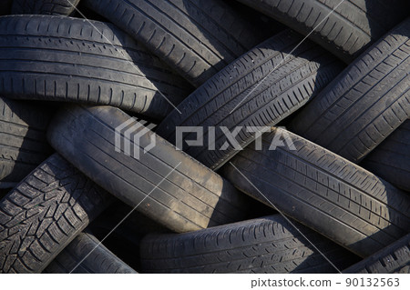 used tire pile garage waste for recycling black rubber background 90132563