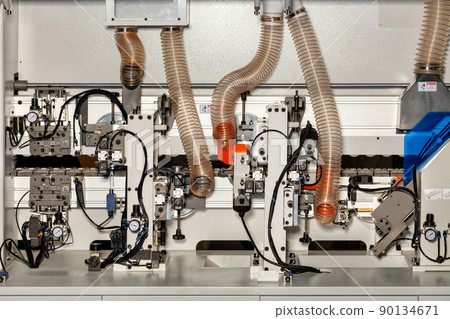 Internal air system of a modern woodworking machine with pressure gauges and control mechanisms. 90134671