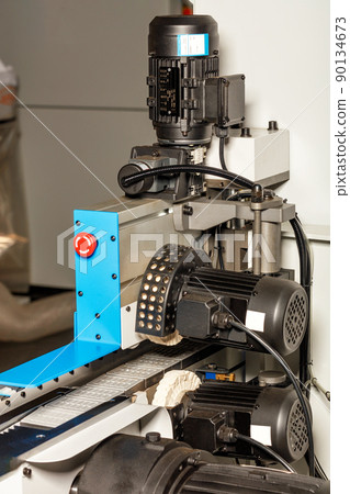 Industrial polishing machine with cloth wheels and tape drive. Industrial polishing machine with cloth wheels and tape drive. 90134673