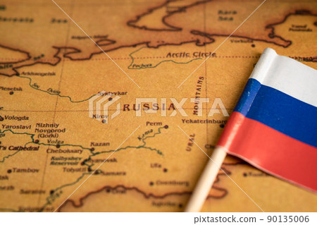 Bangkok, Thailand - February 1, 2022 Russia flag on world map background. Bangkok, Thailand - February 1, 2022 Russia flag on world map background. 90135006