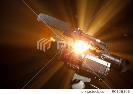 broadcast video camera against the shiny background broadcast video camera against the shiny background 90136368