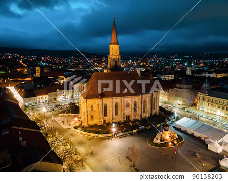 Aerial drone view of Saint Michael Church in Cluj at evening, Romania 90138203
