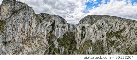 Aerial drone panoramic view of a rocky canyon in Romania 90138204
