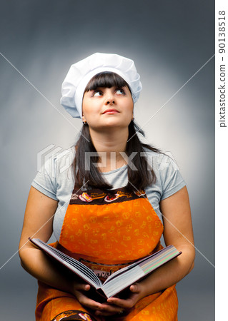 woman cook reading recipes woman cook reading recipes 90138518
