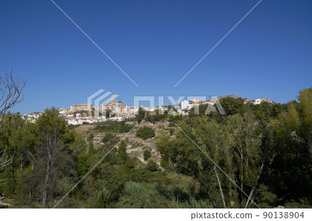 Mountain village among trees with blue sky Mountain village among trees with blue sky 90138904