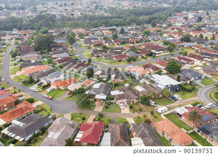 Drone aerial photograph of high density residential houses in the suburb of Glenmore Park 90139731