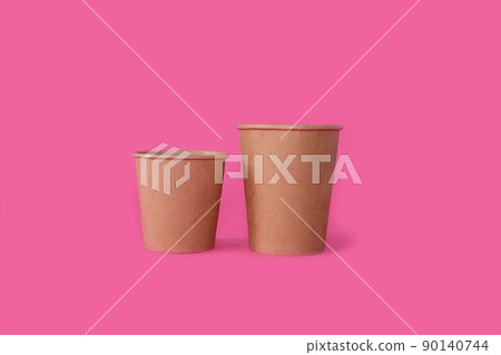 Two Paper glass on a bright pink background 90140744