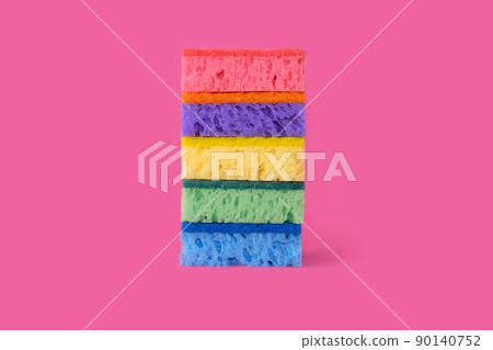 Sponges for washing dishes on a bright pink background. Sponges for washing dishes on a bright pink background. 90140752