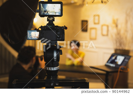 Shooting site cameraman model 90144962