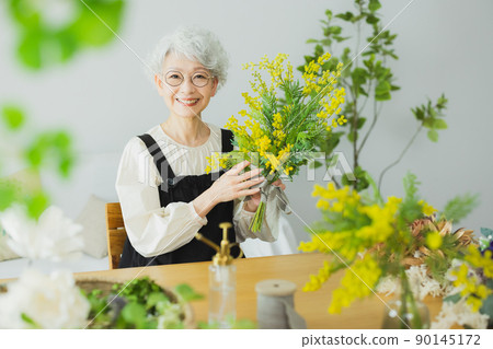 Gray-haired woman lifestyle mimosa 90145172