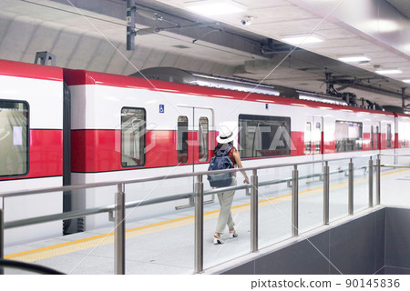 Woman traveler walking at train station,Travel insurance concept Woman traveler walking at train station,Travel insurance concept 90145836