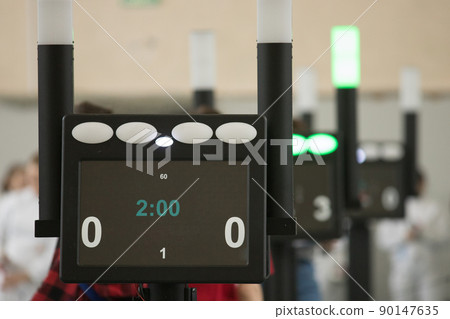 Fencing tournament. A counting electronic device standing in the hall Fencing tournament. A counting electronic device standing in the hall 90147635