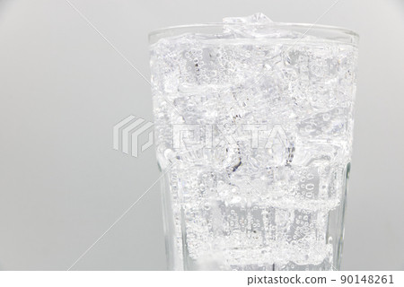 Soda sparkling water with Ice in glass over white background. 90148261