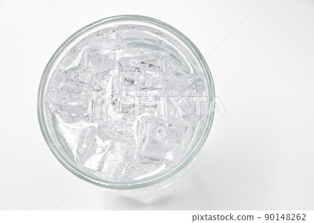 Soda sparkling water with Ice in glass over white background. Soda sparkling water with Ice in glass over white background. 90148262