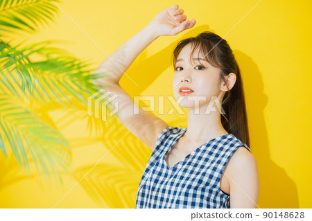Summer woman yellow background Summer woman yellow background 90148628