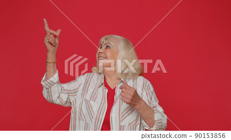 Woman pointing empty place, advertising area for commercial text, copy space for goods promotion Woman pointing empty place, advertising area for commercial text, copy space for goods promotion 90153856
