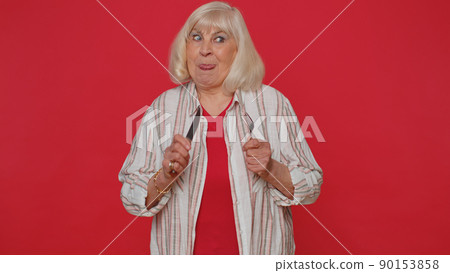 Hungry senior woman waiting for serving dinner dishes with cutlery, will appreciate delicious meal 90153858