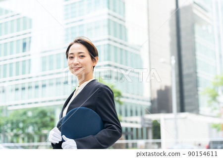 Smiley female driver (driver, taxi, bus) 90154611