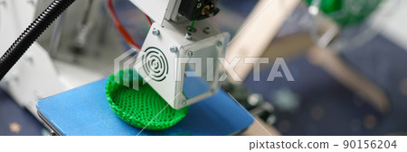 3D printer produces creates a detail for the layout 3D printer produces creates a detail for the layout 90156204