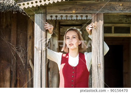 Latvian woman in traditional clothing. Ligo folk. Latvian woman in traditional clothing. Ligo folk. 90156470
