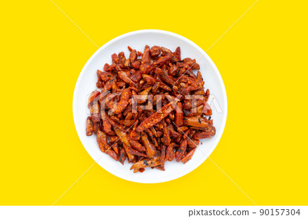 Fried Chili, Spicy snack on white background. 90157304