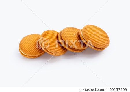 Custard cream sandwich biscuits on white background. Custard cream sandwich biscuits on white background. 90157309