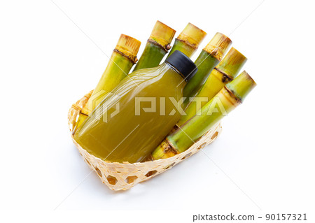 Bottle of fresh squeezed sugar cane juice 90157321
