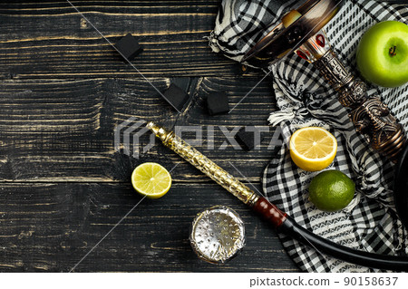 Arabic hookah with a tobacco flavor of a mixture of citruses and apple Arabic hookah with a tobacco flavor of a mixture of citruses and apple 90158637