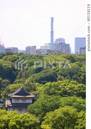 Edo Castle's Sakurada Tatsumiyagura and the distant Ministry of Defense steel tower in the direction of Chiyoda and Shinjuku, Chiyoda-ku, Tokyo Edo Castle's Sakurada Tatsumiyagura and the distant Ministry of Defense steel tower in the direction of Chiyoda and Shinjuku, Chiyoda-ku, Tokyo 90159219