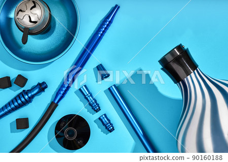 Top view of Hookah parts on light blue background Top view of Hookah parts on light blue background 90160188