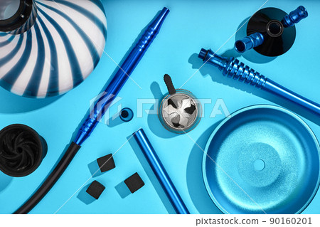 Top view of Hookah parts on light blue background 90160201