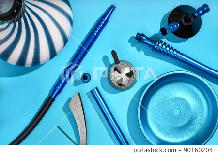 Top view of Hookah parts on light blue background 90160203