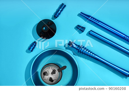 Top view of Hookah parts on light blue background 90160208