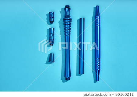 Top view of Hookah parts on light blue background 90160211