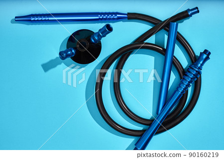 Top view of Hookah parts on light blue background 90160219