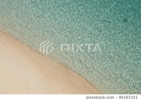 White sand beach and emerald green sea White sand beach and emerald green sea 90163281