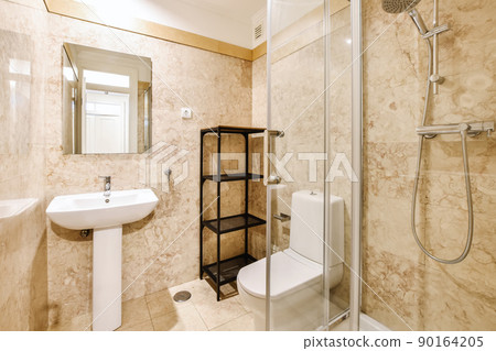 Luxury bathroom design with beige marble and tiled floor 90164205