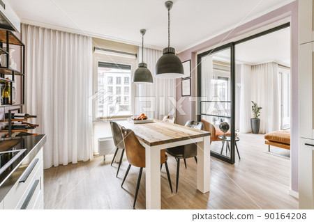 Bright dining room in a modern luxury house Bright dining room in a modern luxury house 90164208