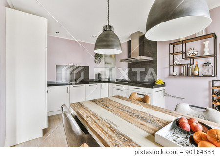 Bright dining room in a modern luxury house Bright dining room in a modern luxury house 90164333