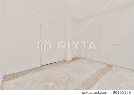 Spacious empty apartment in an open design in a minimalist style in a modern house Spacious empty apartment in an open design in a minimalist style in a modern house 90165169