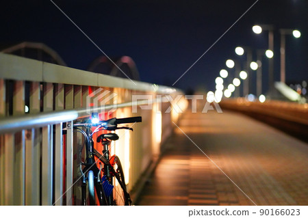 Cross bike (bicycle) that temporarily stops at the bridge at night Cross bike (bicycle) that temporarily stops at the bridge at night 90166023