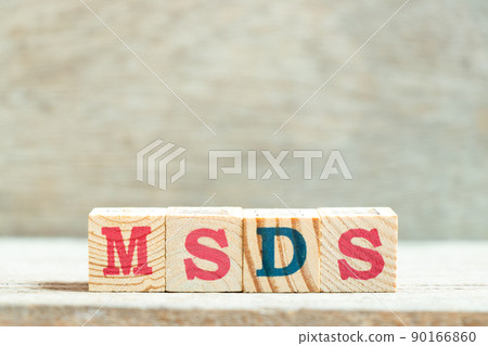 Alphabet letter block in word MSDS (Abbreviation of material safety data sheet) on wood background 90166860